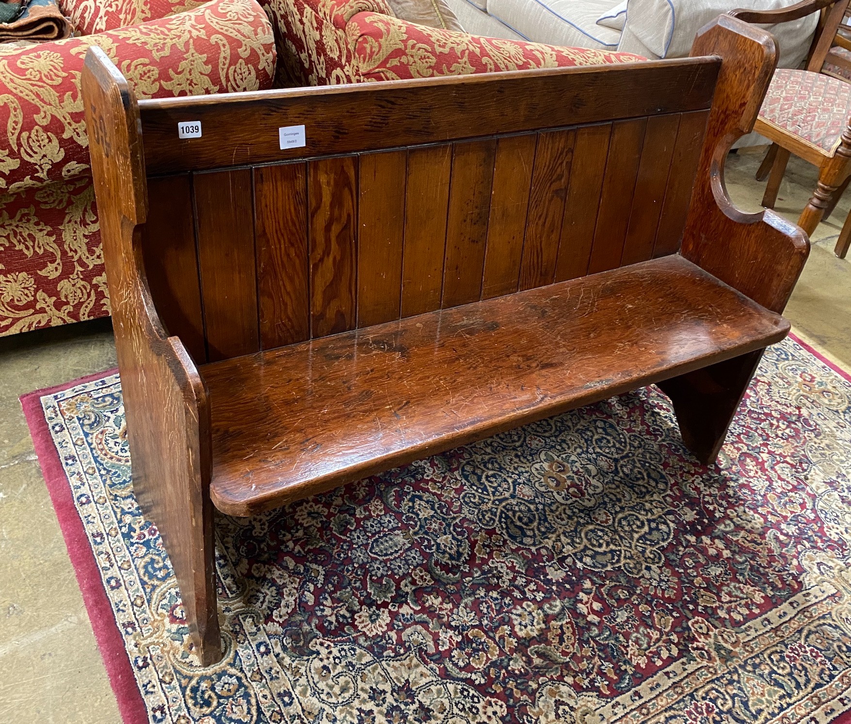 A Victorian pitch pine pew, length 120cm, depth 49cm, height 89cm